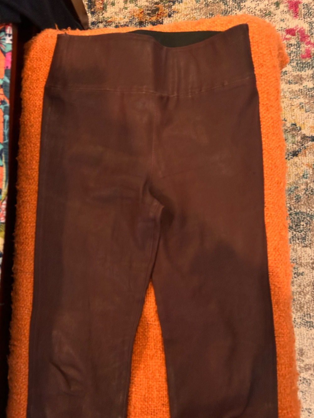 Dark Brown/maroon stretch leather leggings.